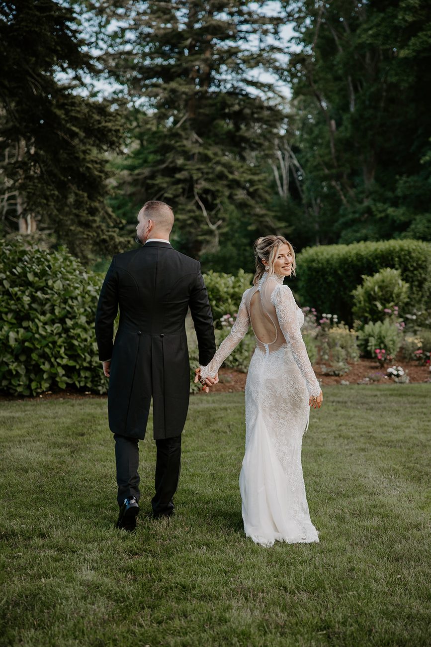Jim and Anne walking across the lawn at Glen Manor House, Portsmouth RI