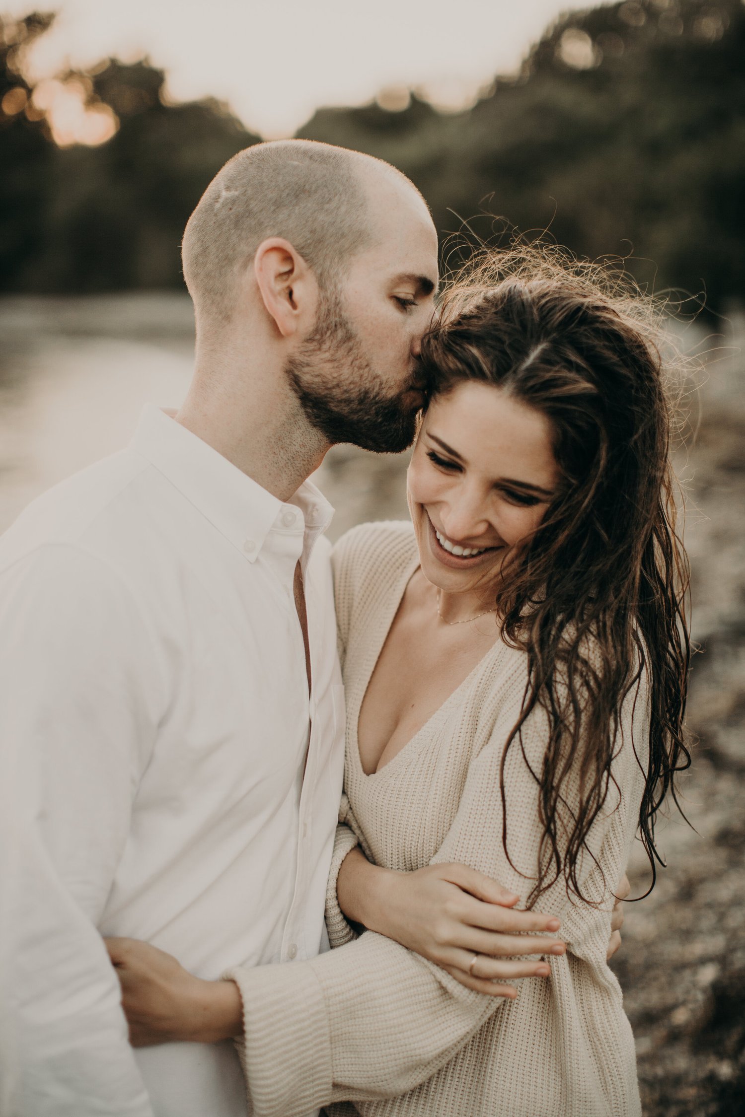 Couple embracing at golden hour
